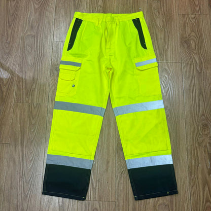 Fluorescent yellow high visibility work pants with reflective strips and multi-pocket design for construction safety